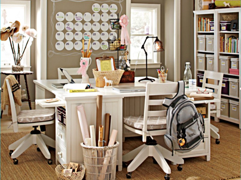 Float desks in the middle of a room that several kids can work from. Like this study room, add a wall bookcase, baskets and additional items to keep the room well-organized. Image: SF Organized Interiors